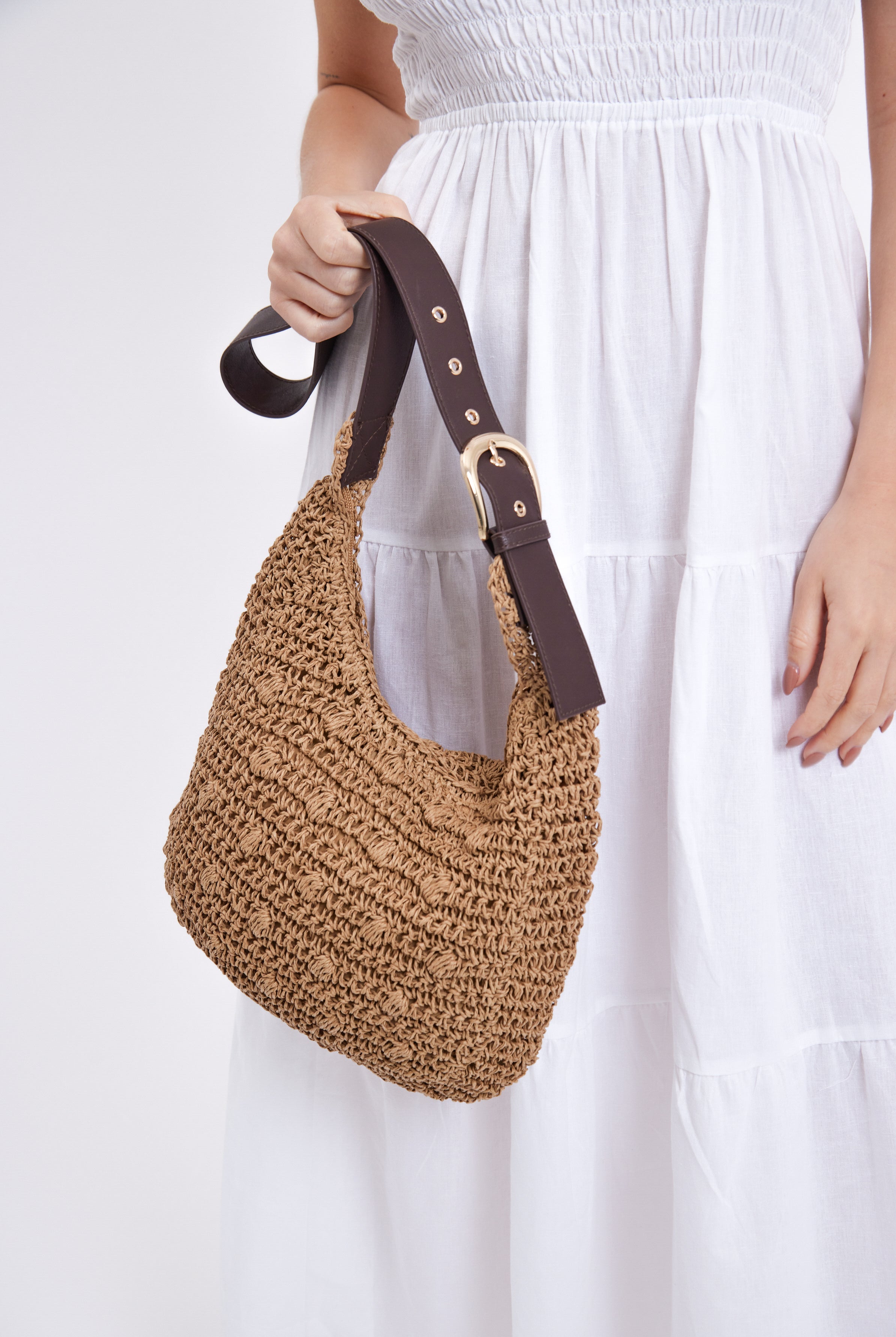 Women’s Woven Sling Bag with Buckle Strap in Brown