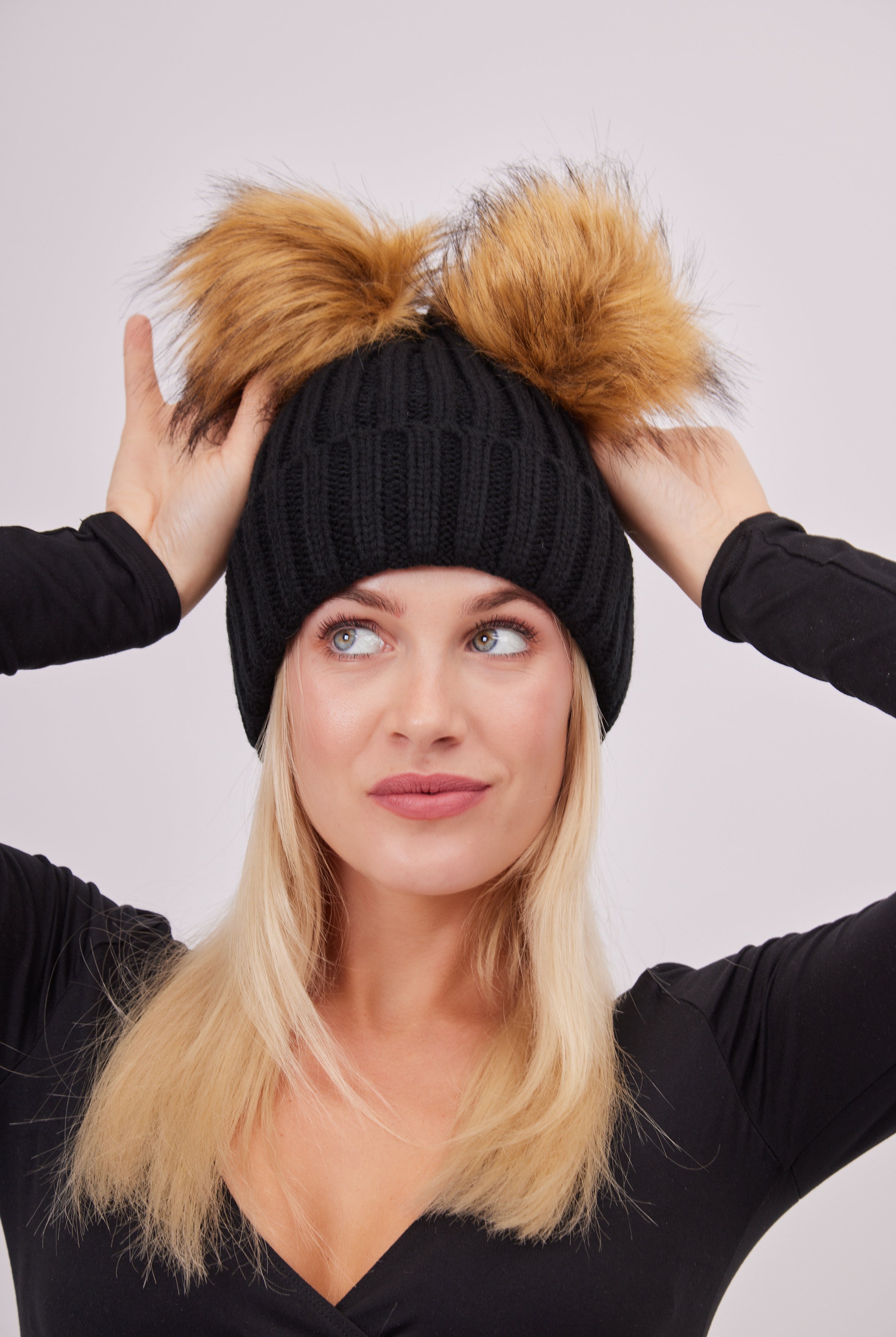 Woman's Knitted Double Fur Pom Beanie in Black