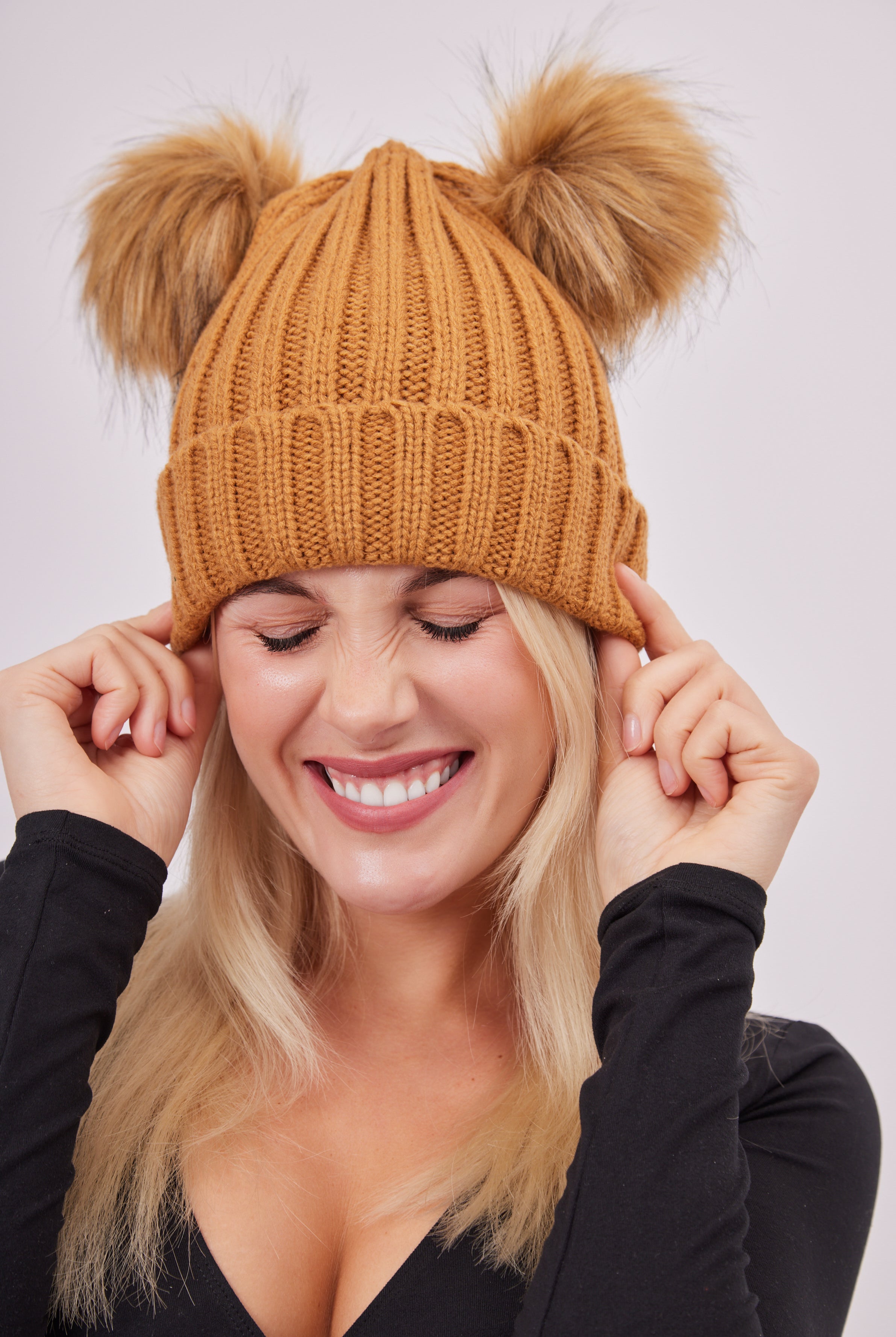 Woman's Knitted Double Fur Pom Beanie in Toffee Brown