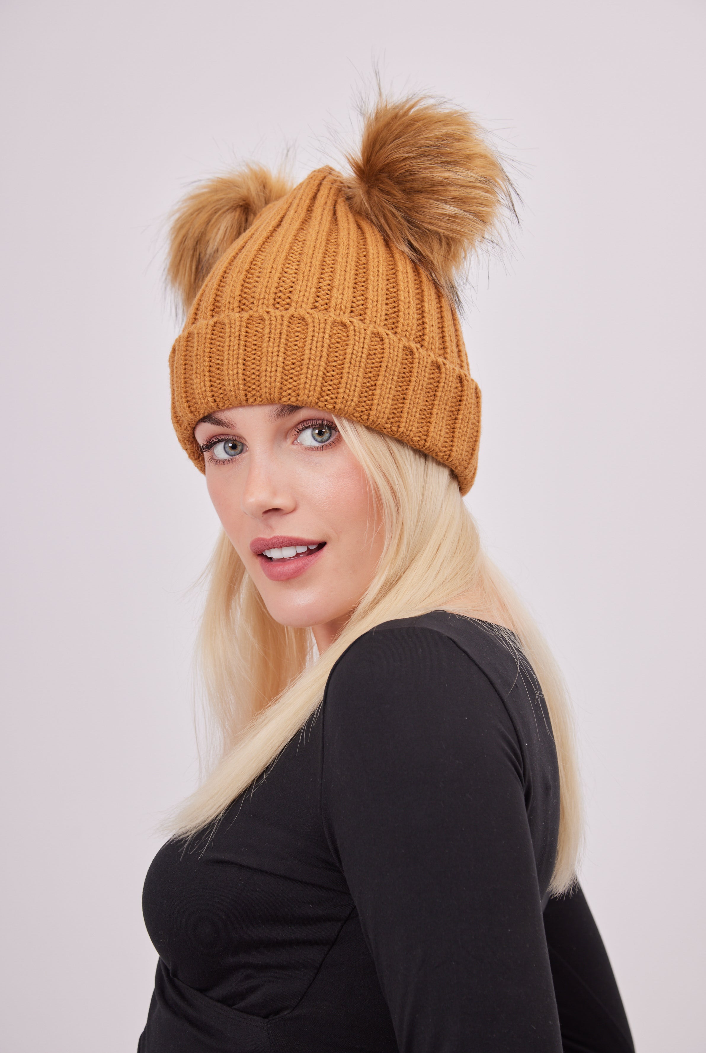 Woman's Knitted Double Fur Pom Beanie in Toffee Brown