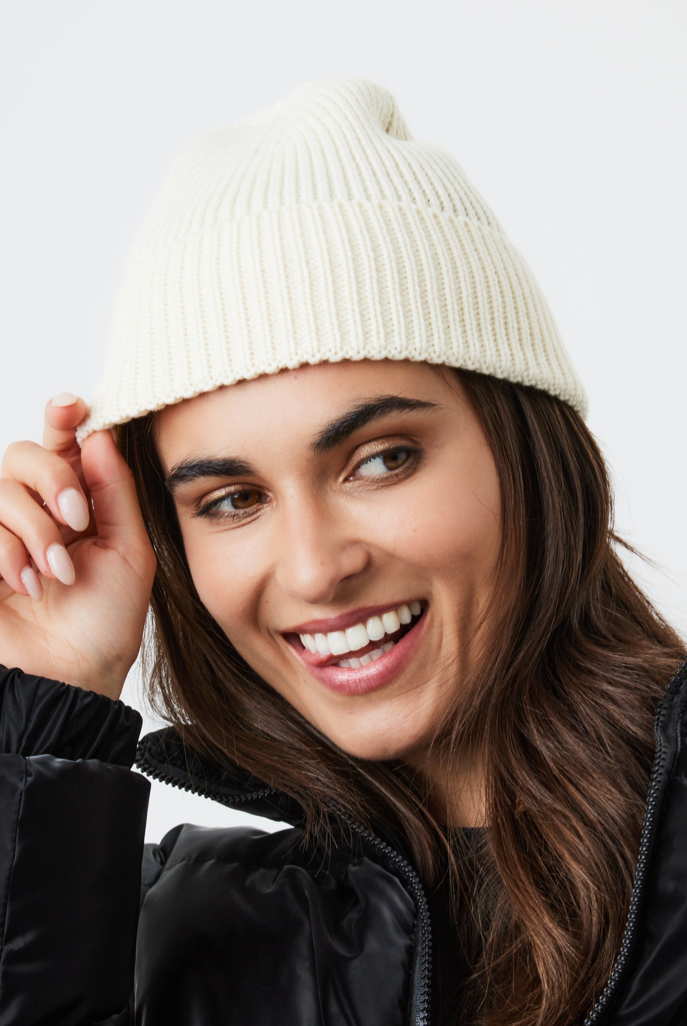 Woman's Ribbed Knitted Beanie in Cream