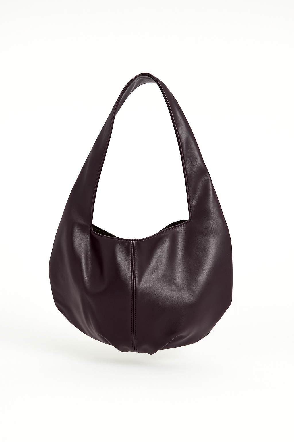 Burgundy leather handbag on a white background