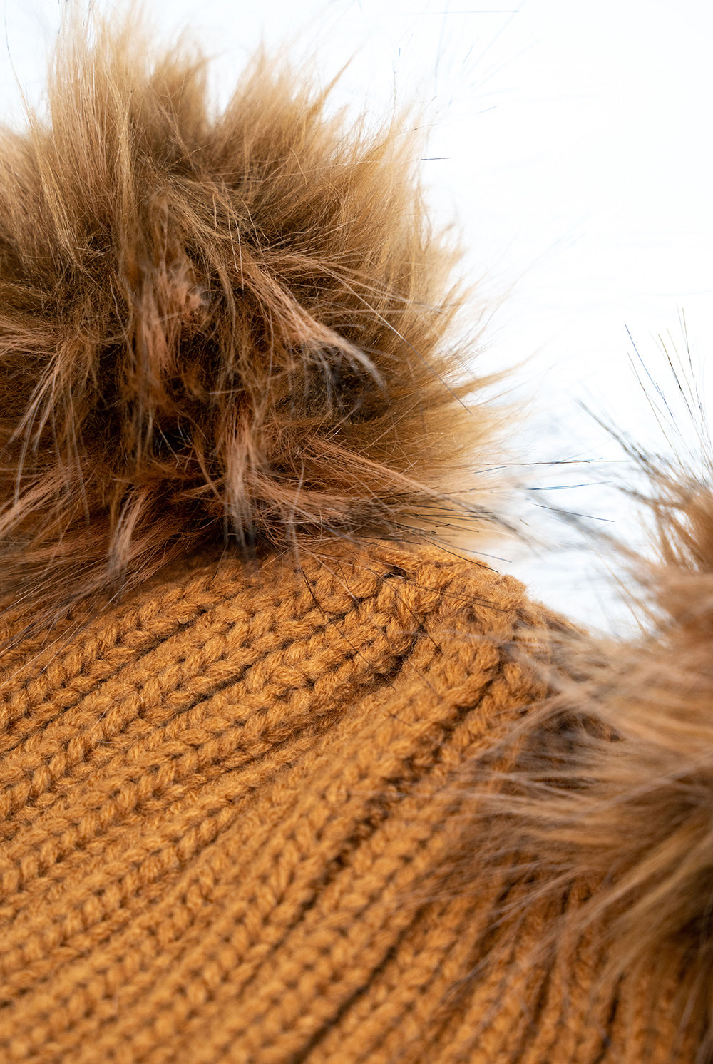 Woman's Knitted Double Fur Pom Beanie in Toffee Brown