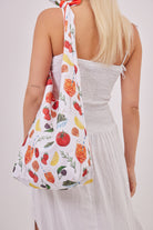 Tomato Girl Knotted Tote Bag in Multicoloured | tomato girl accessories | tomato girl bag | fruit print bag | veg print bag | tapas print bag | knot bag | summer bag | hobo bag | holiday bag | beach bag | city break accessories | women's accessories | women's bag | festival bag | portuguese girlie