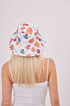 Oversized Tomato Girl Printed Bucket Hat in Multicolour | beach hat | holiday hat | festival hat | bucket hats | tomato girl hat | tomato girl | fruit print hat | veg print hat | tomato girl accessories | women's hats | women's accessories | streetwear accessories | street style accessories