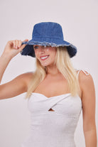 Frayed Edge Denim Bucket Hat in Blue | distressed hat | bucket hats | festival hat | summer hat | holiday hat | beach hat | denim hat | denim accessories | minimal hats | women's hats | women's hat | frayed hat 