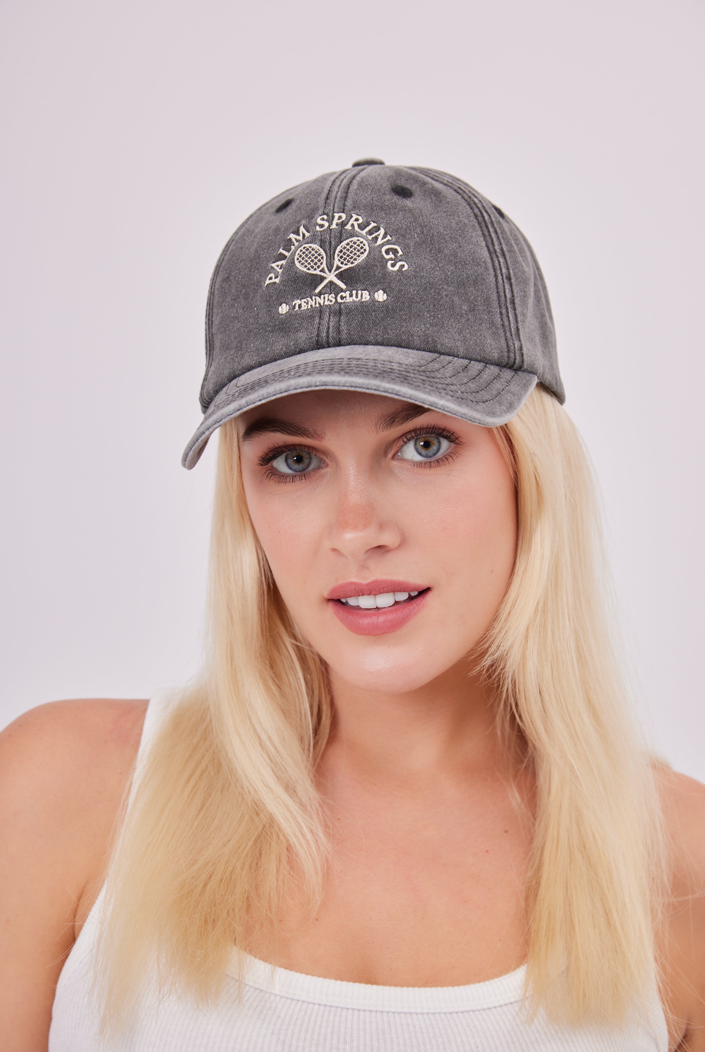 My Accessories London Palm Springs Baseball Cap in Washed Black | athleisure | activewear | gym hat | gym cap | sporty accessories | sporty cap | sporty hat | summer accessories | summer hat | summer hats | summer cap | spring accessories | spring hat | embroidered hat | embroidered cap | baseball cap | distressed cap | retro cap | women's cap 
