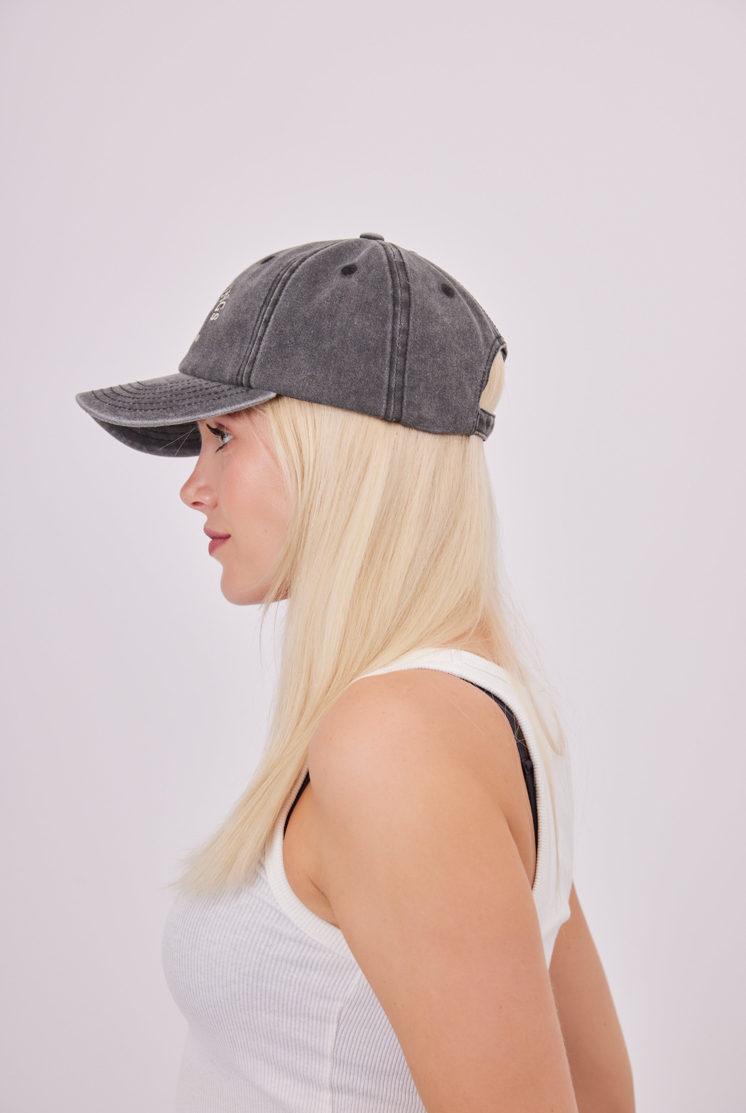 My Accessories London Palm Springs Baseball Cap in Washed Black | athleisure | activewear | gym hat | gym cap | sporty accessories | sporty cap | sporty hat | summer accessories | summer hat | summer hats | summer cap | spring accessories | spring hat | embroidered hat | embroidered cap | baseball cap | distressed cap | retro cap | women's cap