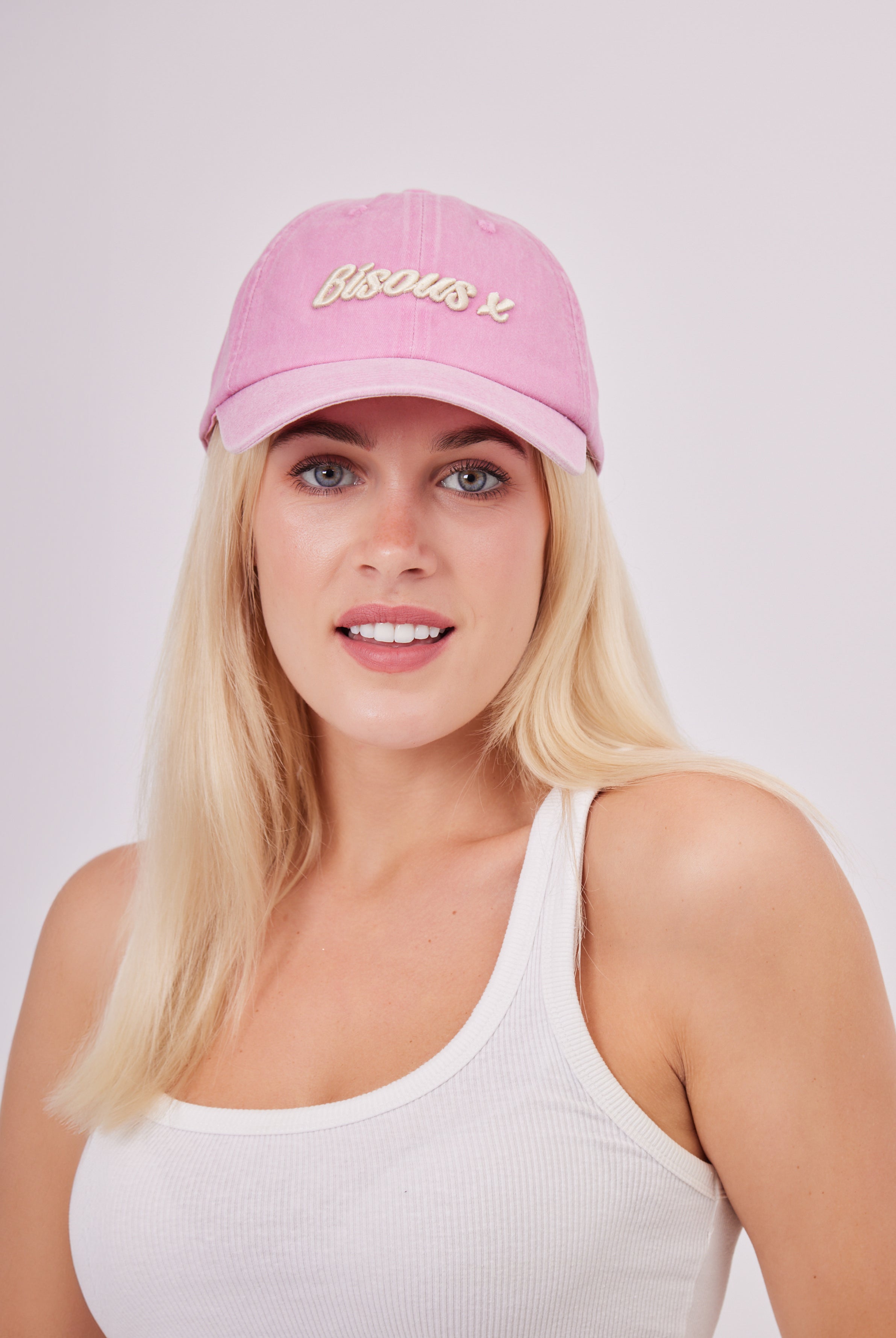 Bisous X Baseball Cap in Washed Pink | romantic | pretty feminine | retro | washed hat | washed baseball cap | retro hat | retro cap | distressed cap | bisous hat | casual hat | baseball cap | summer hat | streetwear hat | streetwear accessories | street style hats | streetstyle cap | streetwear cap | athleisure | sporty | sporty accessories