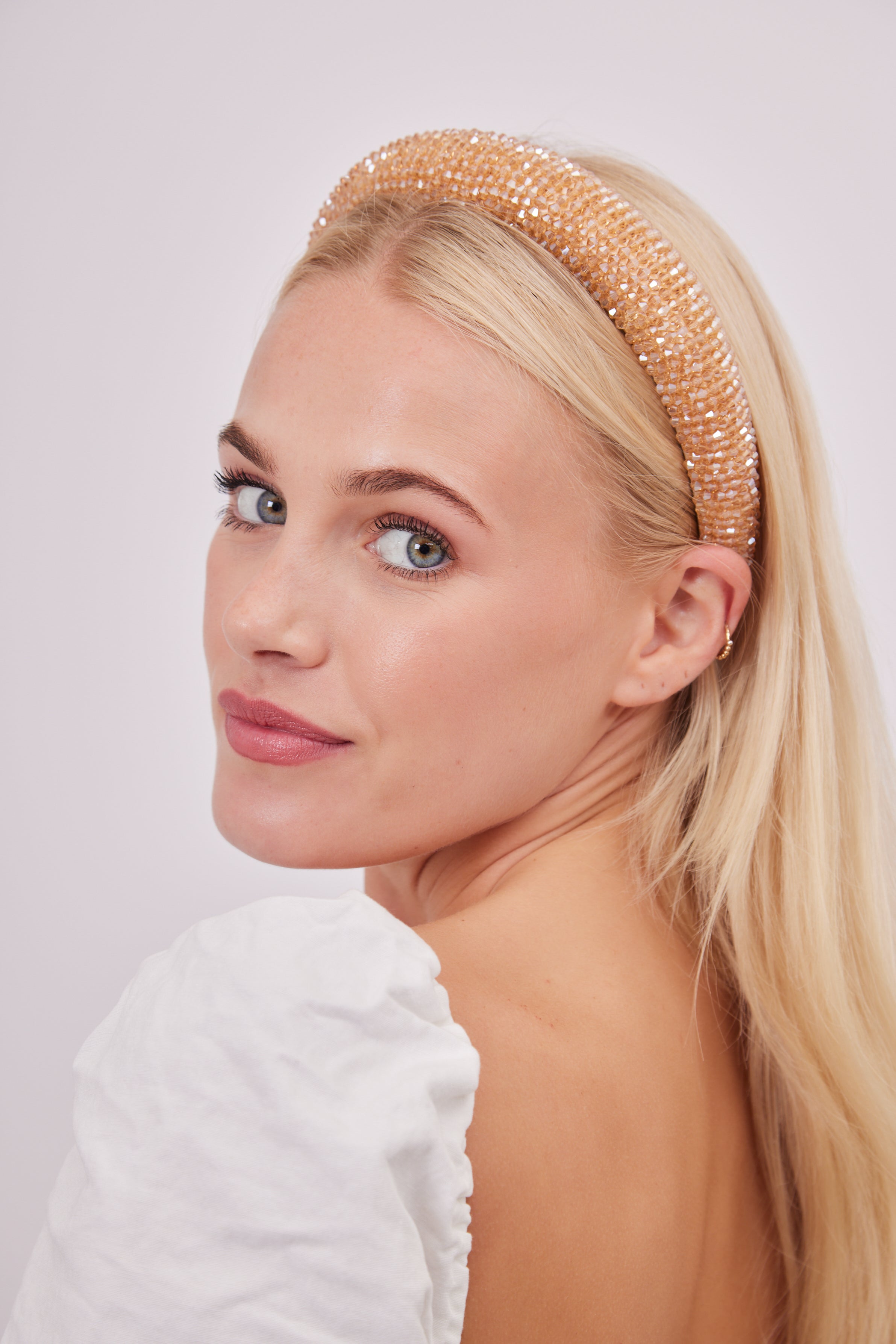Beaded Headband in Champagne | hair accessories | beaded accessories | occasion headband | occasion accessories | quiet luxury accessories | headband | sparkly headband | glittery headband | embellished headband | women's hair accessories | women's headband | glam hair accessories | brunch hair accessories | summer hair accessories | spring hair accessories |