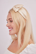 Satin Bow Headband in Cream | satin hair accessories | occasion headband | bow headband | satin bow | wedding headband | bridesmaids headband | races headband | races accessories | wedding accessories | wedding guest accessories | bridesmaids accessories | women's hair accessories | women's headband | lolita accessories | coquette accessories | cottage accessories |