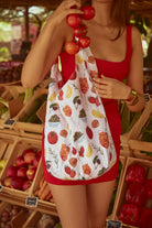 Tomato Girl Knotted Tote Bag in Multicoloured | tomato girl accessories | tomato girl bag | fruit print bag | veg print bag | tapas print bag | knot bag | summer bag | hobo bag | holiday bag | beach bag | city break accessories | women's accessories | women's bag | festival bag | portuguese girlie