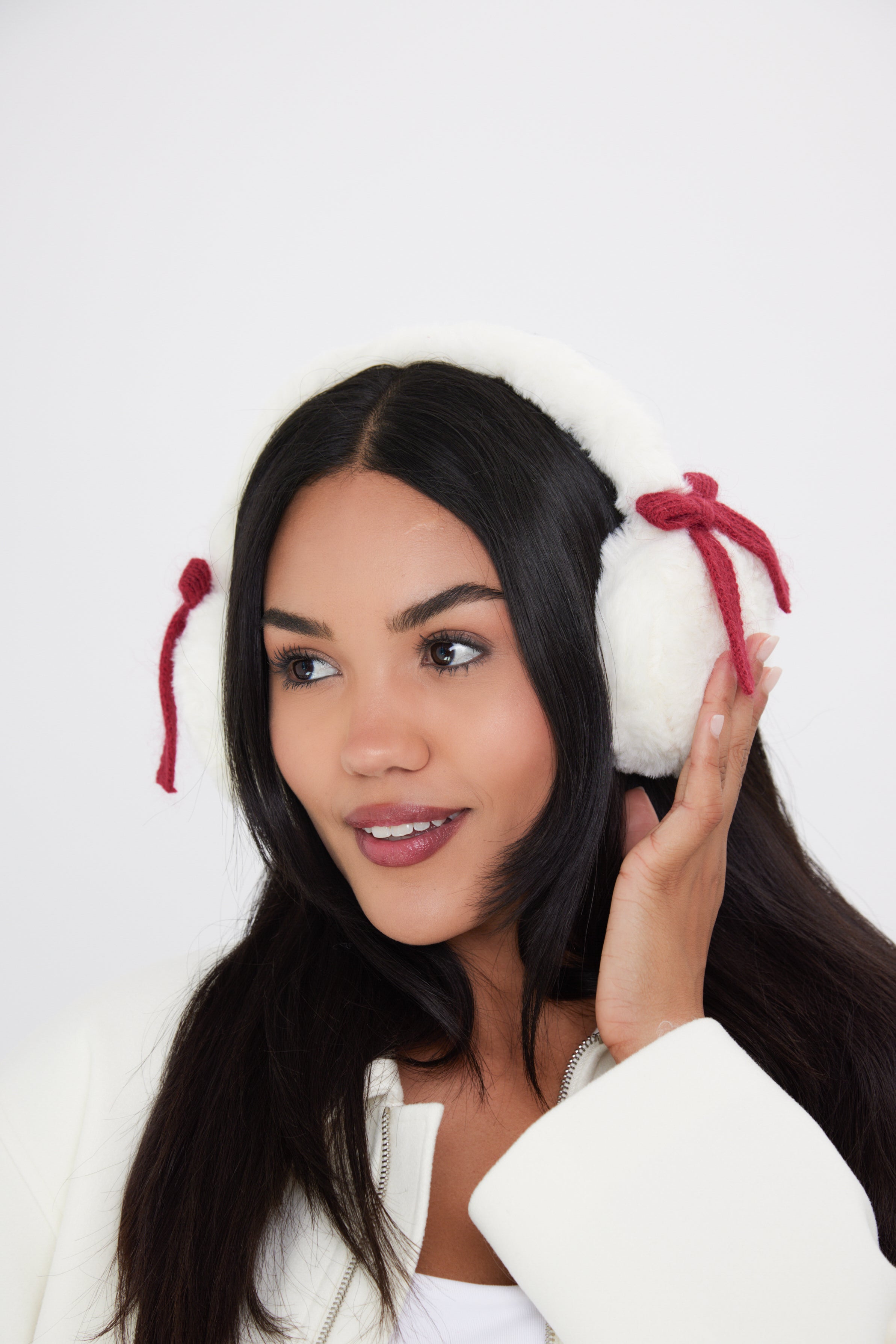 Woman's Fluffy Faux-Fur Earmuffs with Bows in Cream