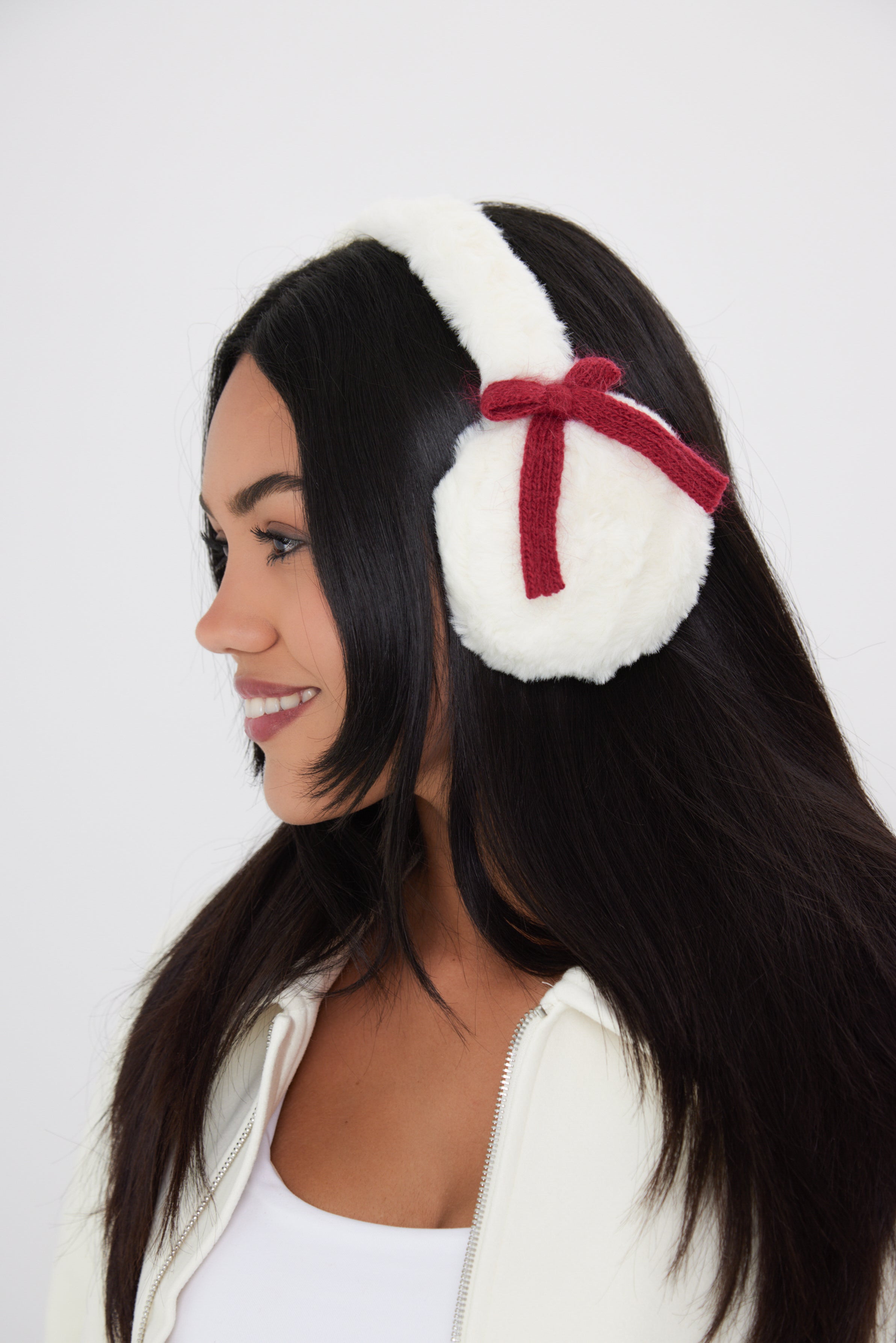 Woman's Fluffy Faux-Fur Earmuffs with Bows in Cream