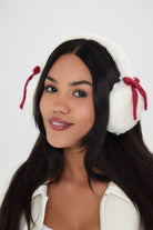 Woman's Fluffy Faux-Fur Earmuffs with Bows in Cream