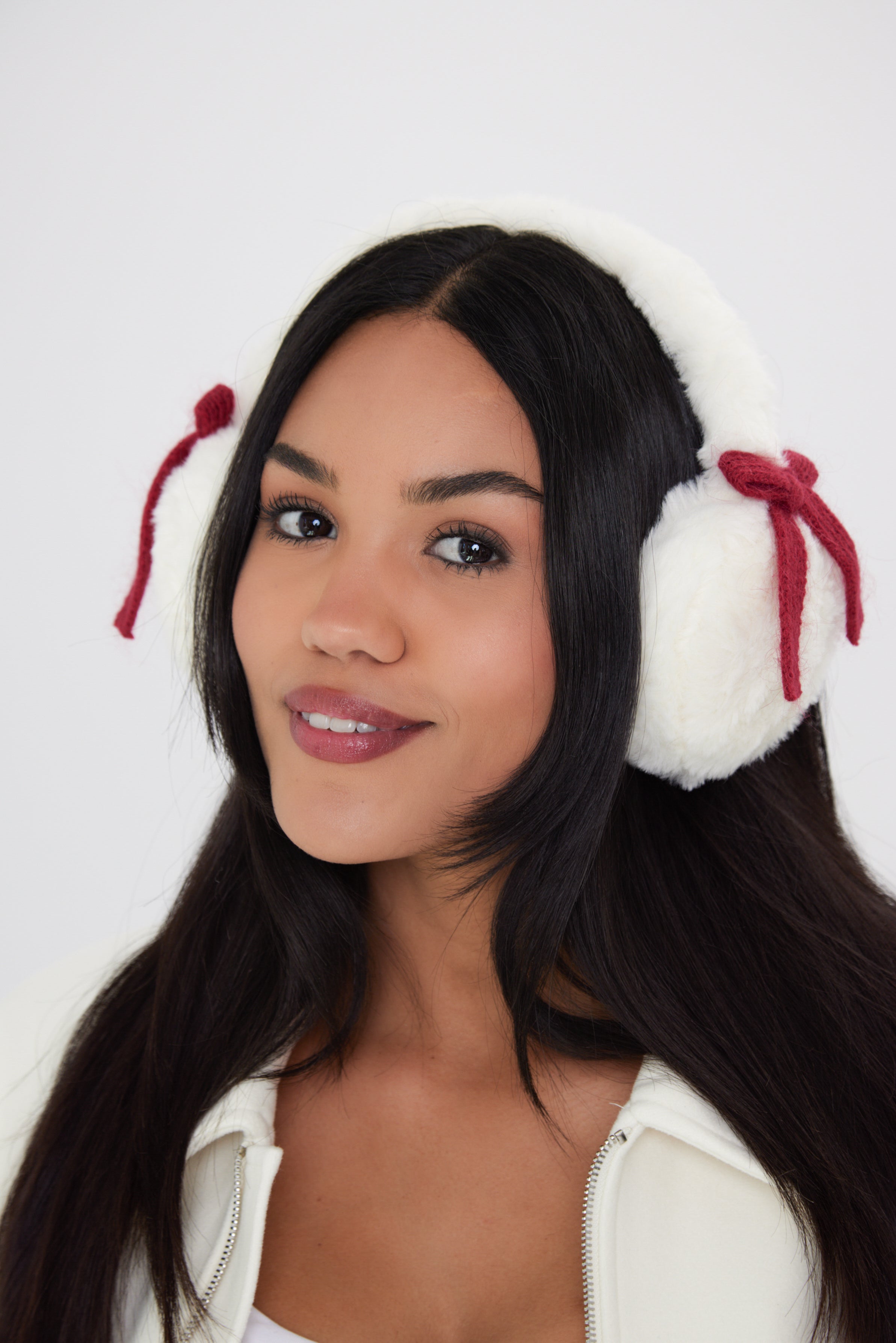 Woman's Fluffy Faux-Fur Earmuffs with Bows in Cream