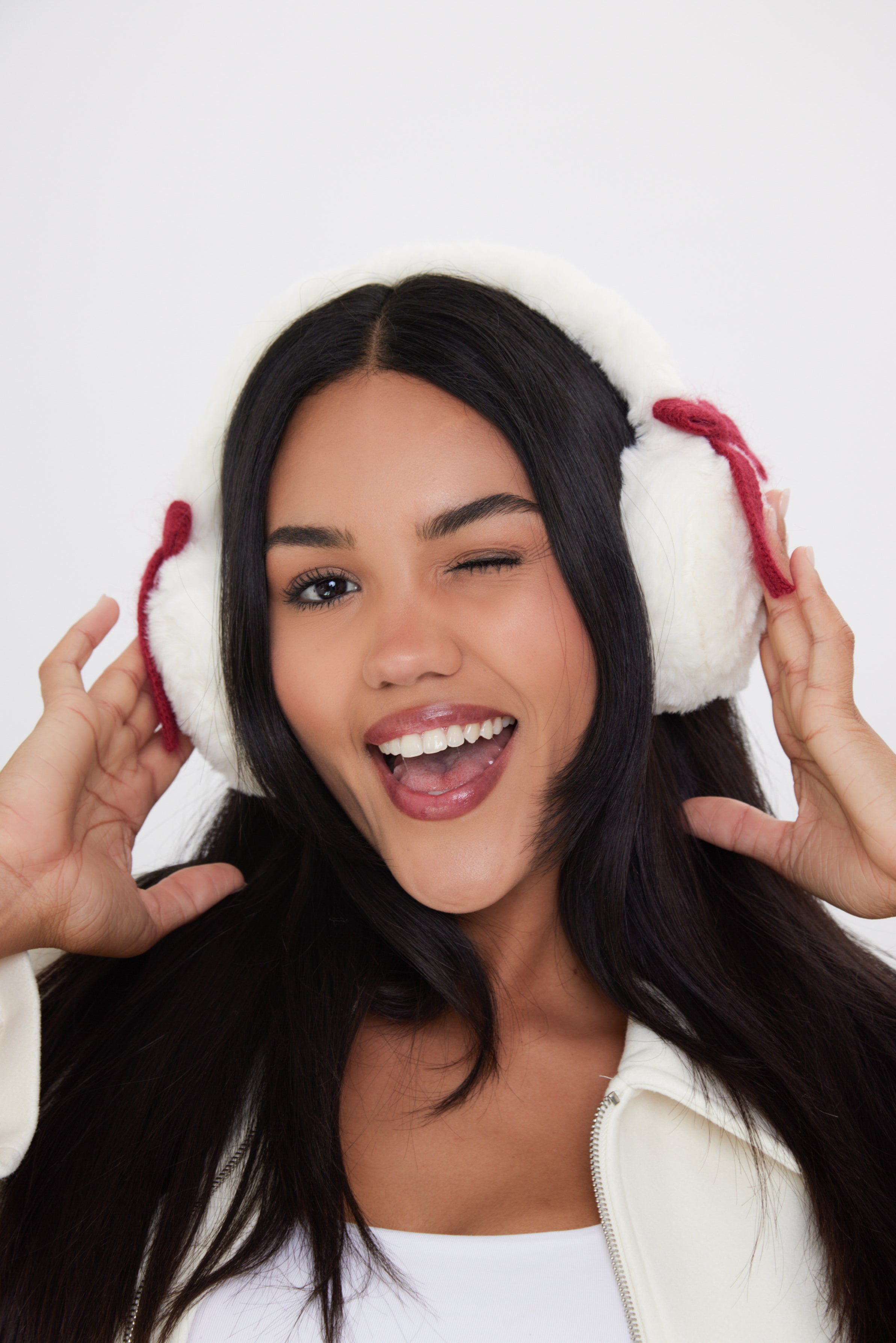 Woman's Fluffy Faux-Fur Earmuffs with Bows in Cream