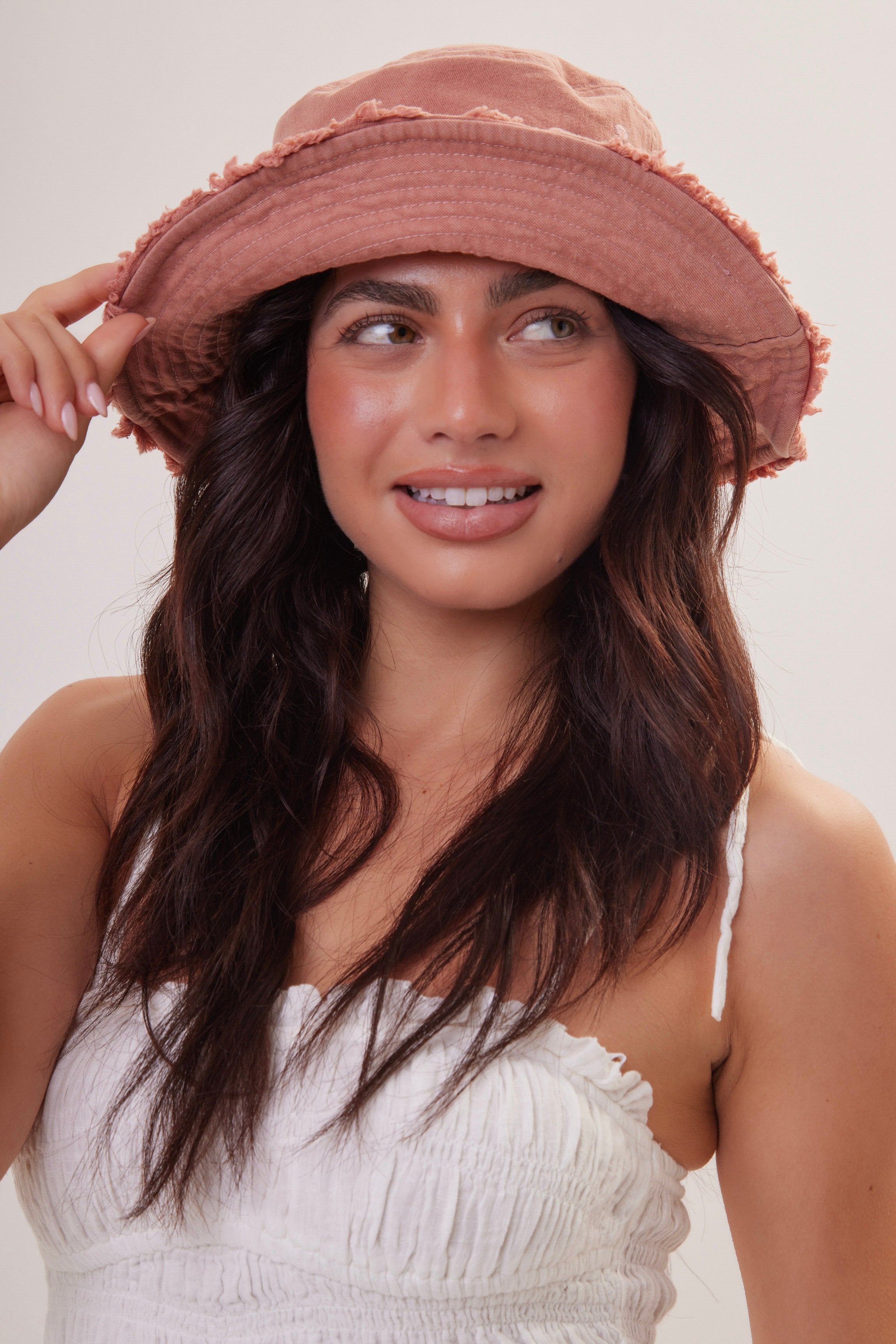 Woman's Frayed Edge Denim Bucket Hat in Pink