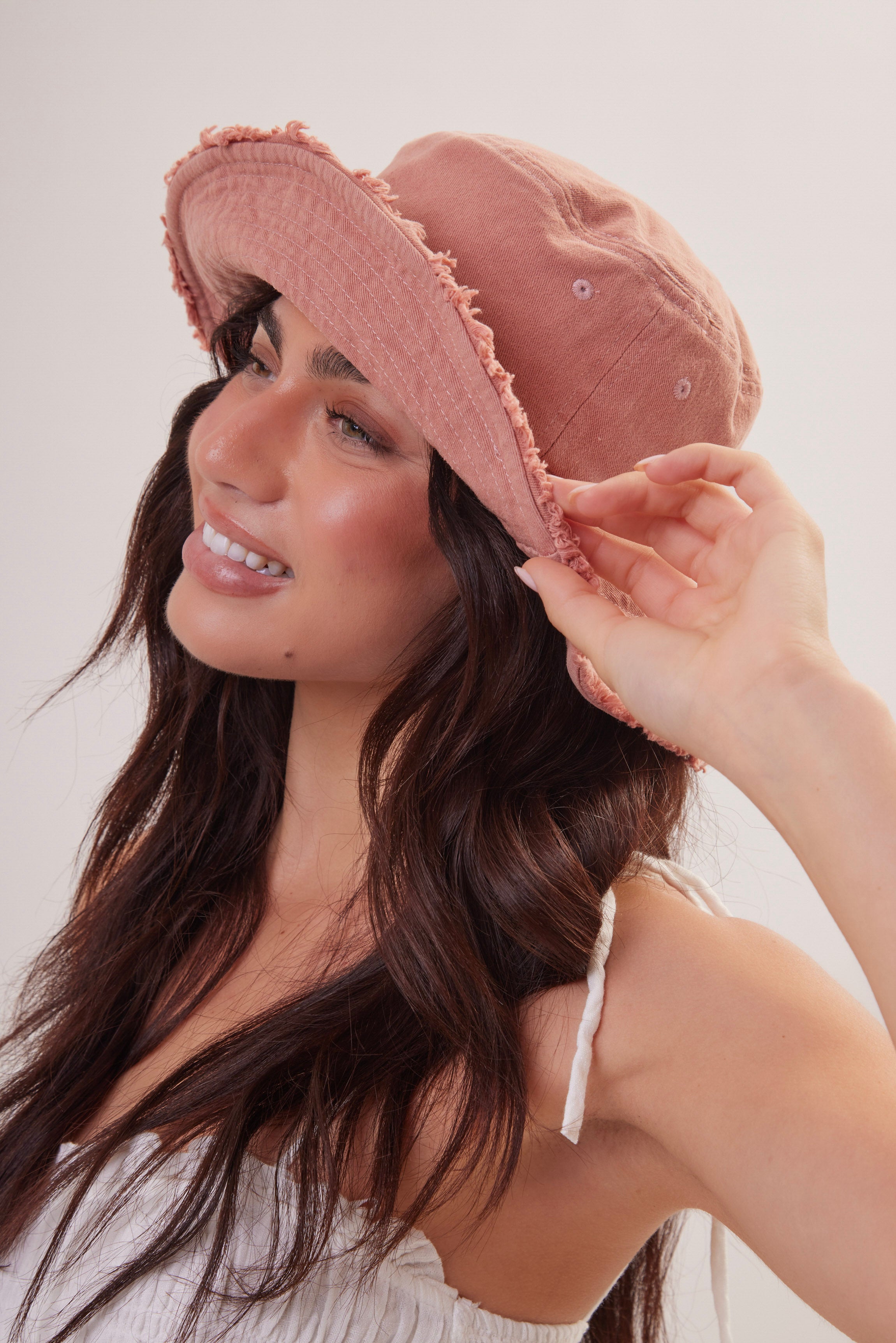 Woman's Frayed Edge Denim Bucket Hat in Pink
