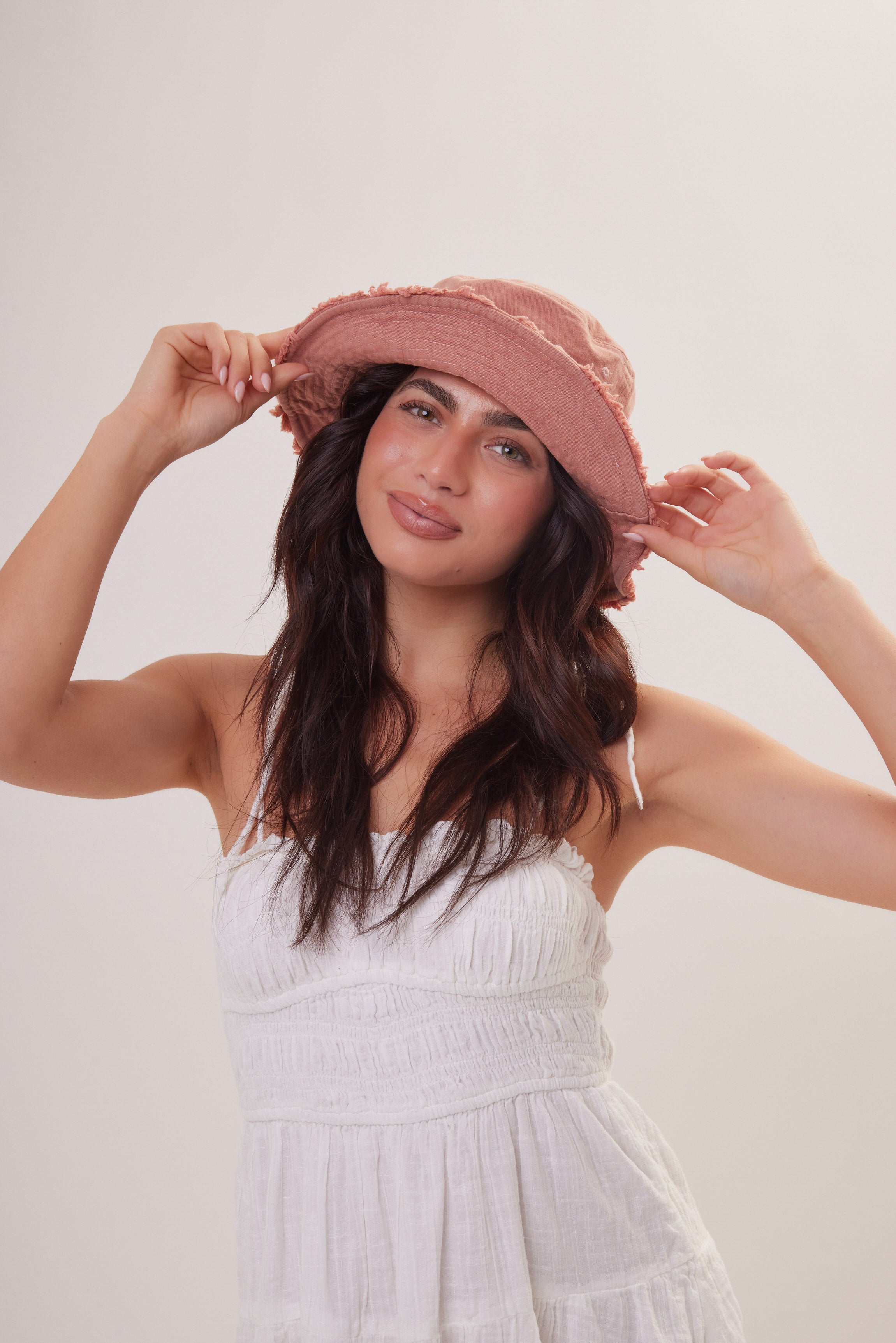 Woman's Frayed Edge Denim Bucket Hat in Pink