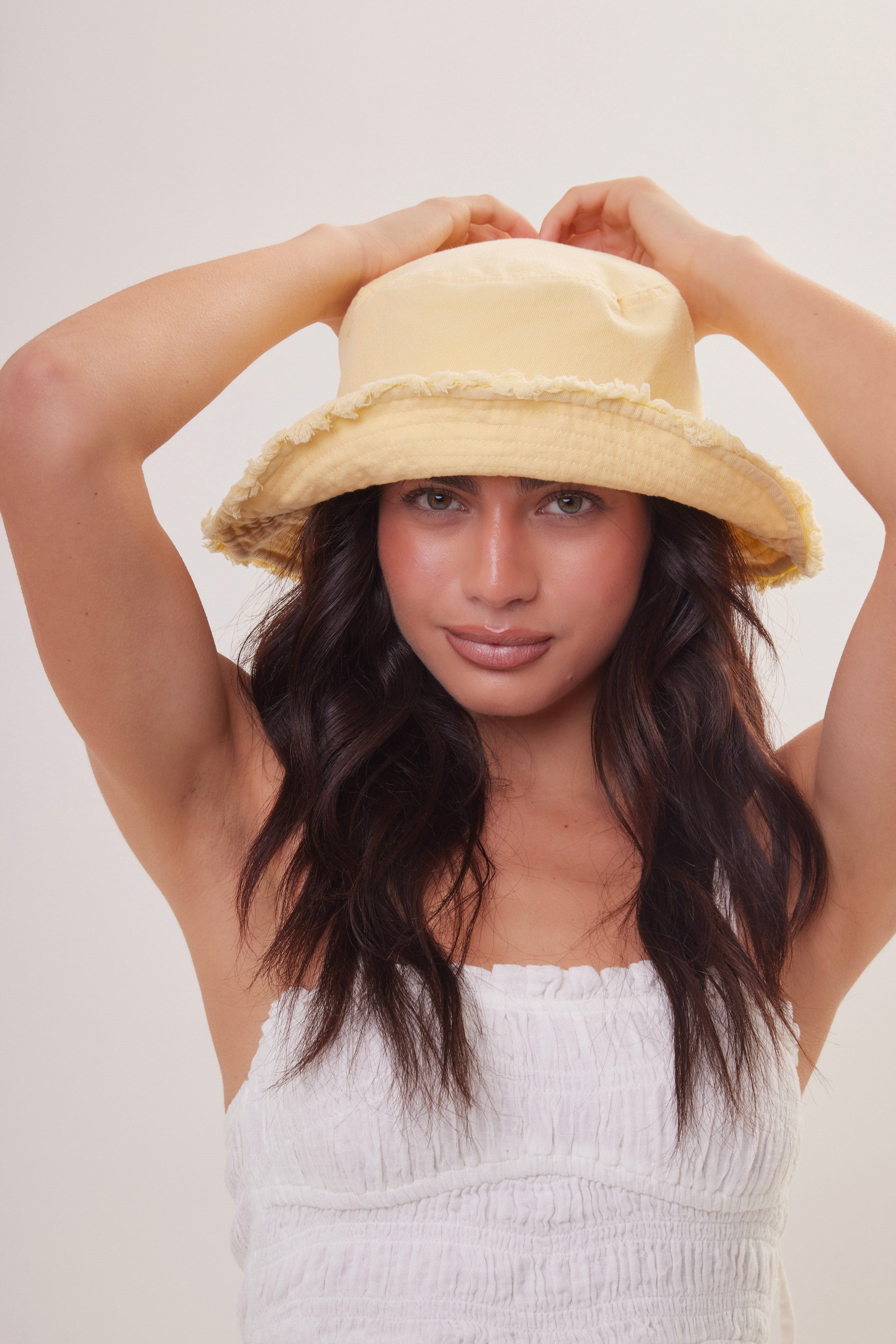 Woman's Frayed Edge Denim Bucket Hat in Yellow