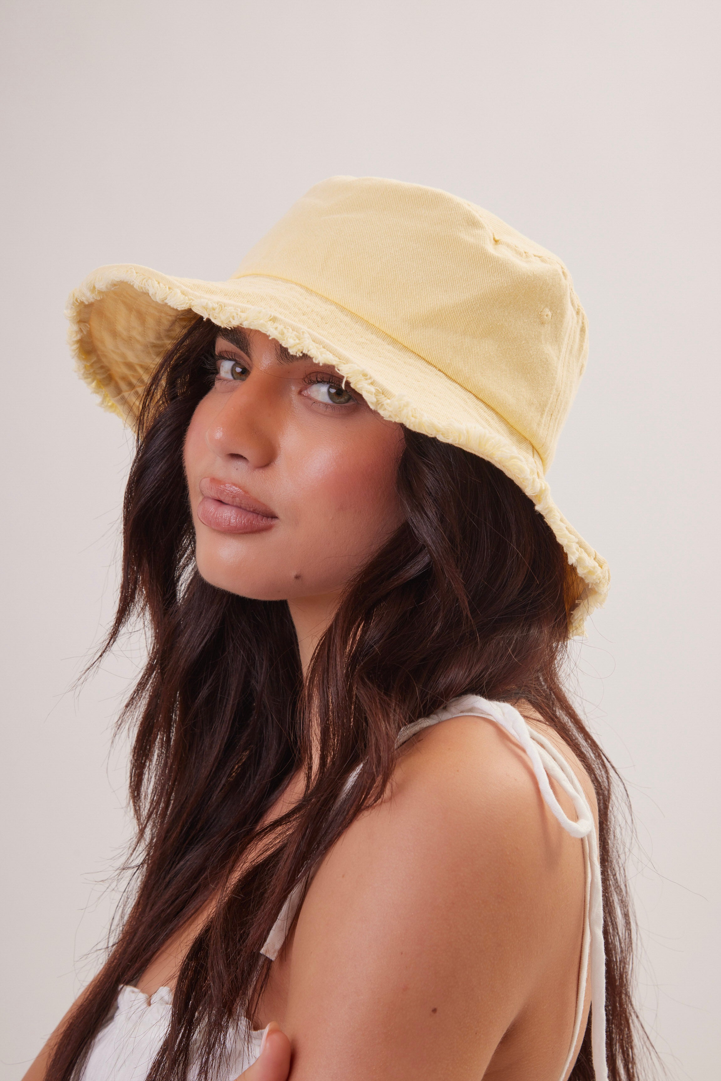Woman's Frayed Edge Denim Bucket Hat in Yellow