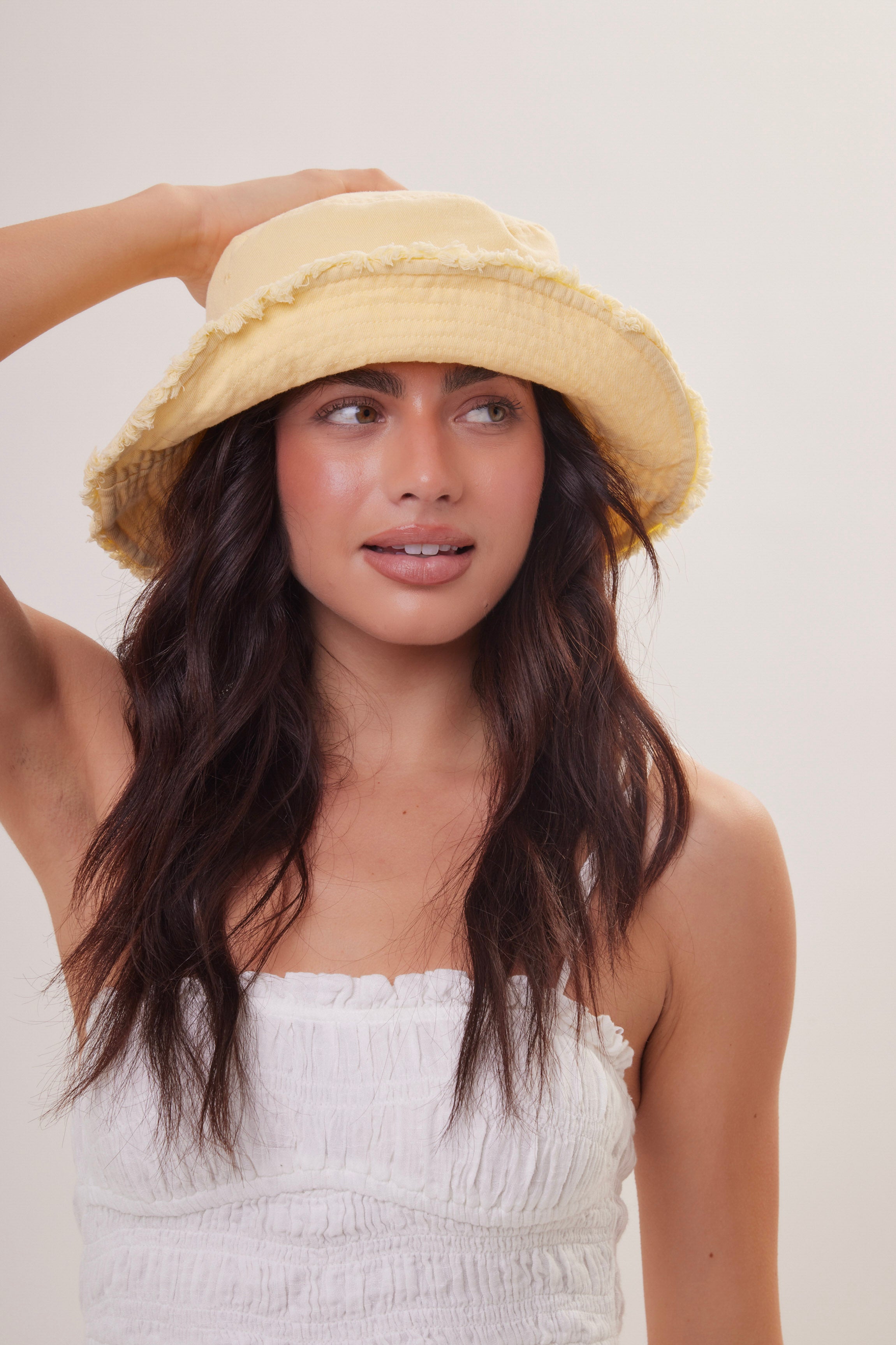 Woman's Frayed Edge Denim Bucket Hat in Yellow