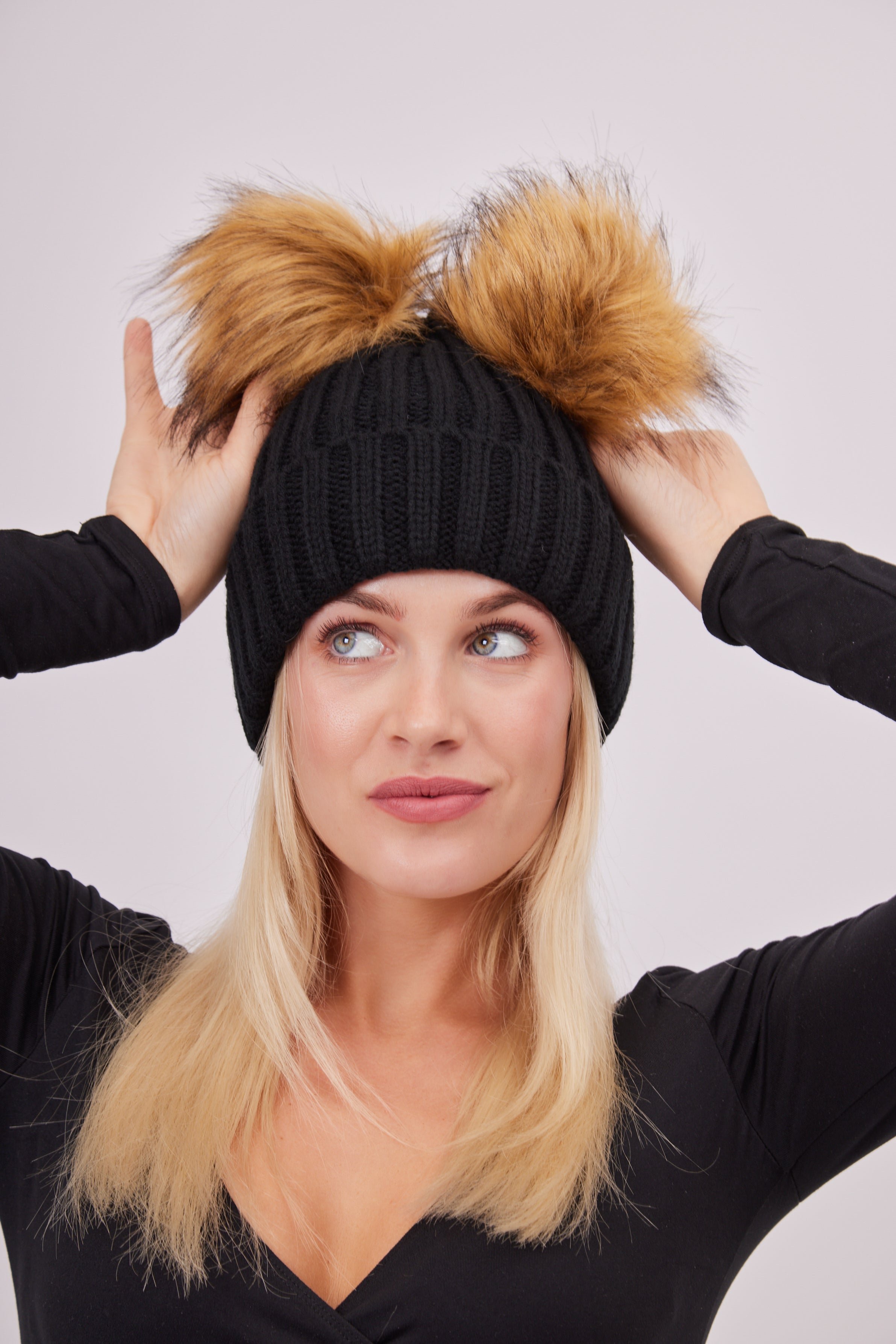 Woman's Knitted Double Fur Pom Beanie in Black