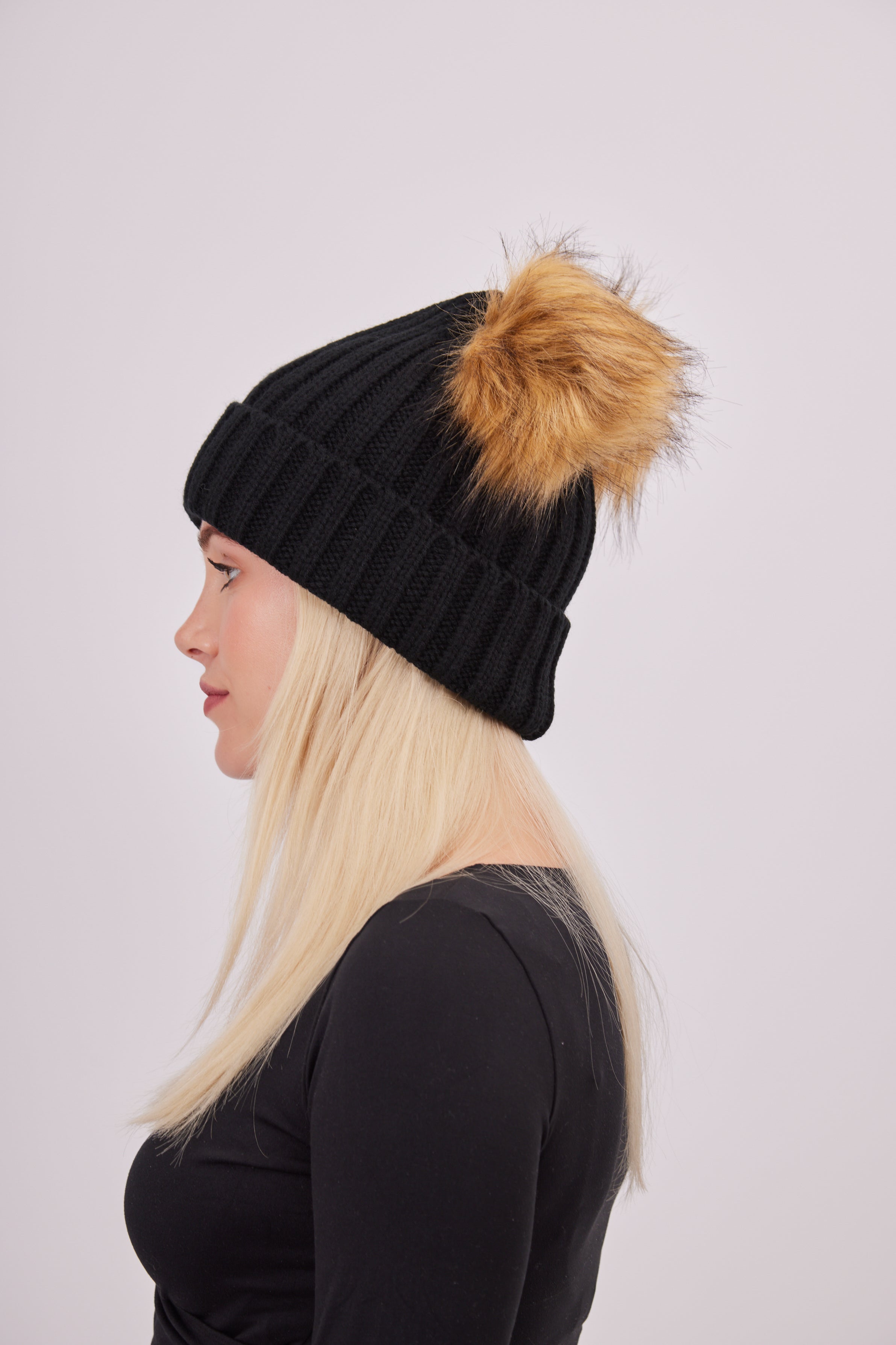 Woman's Knitted Double Fur Pom Beanie in Black