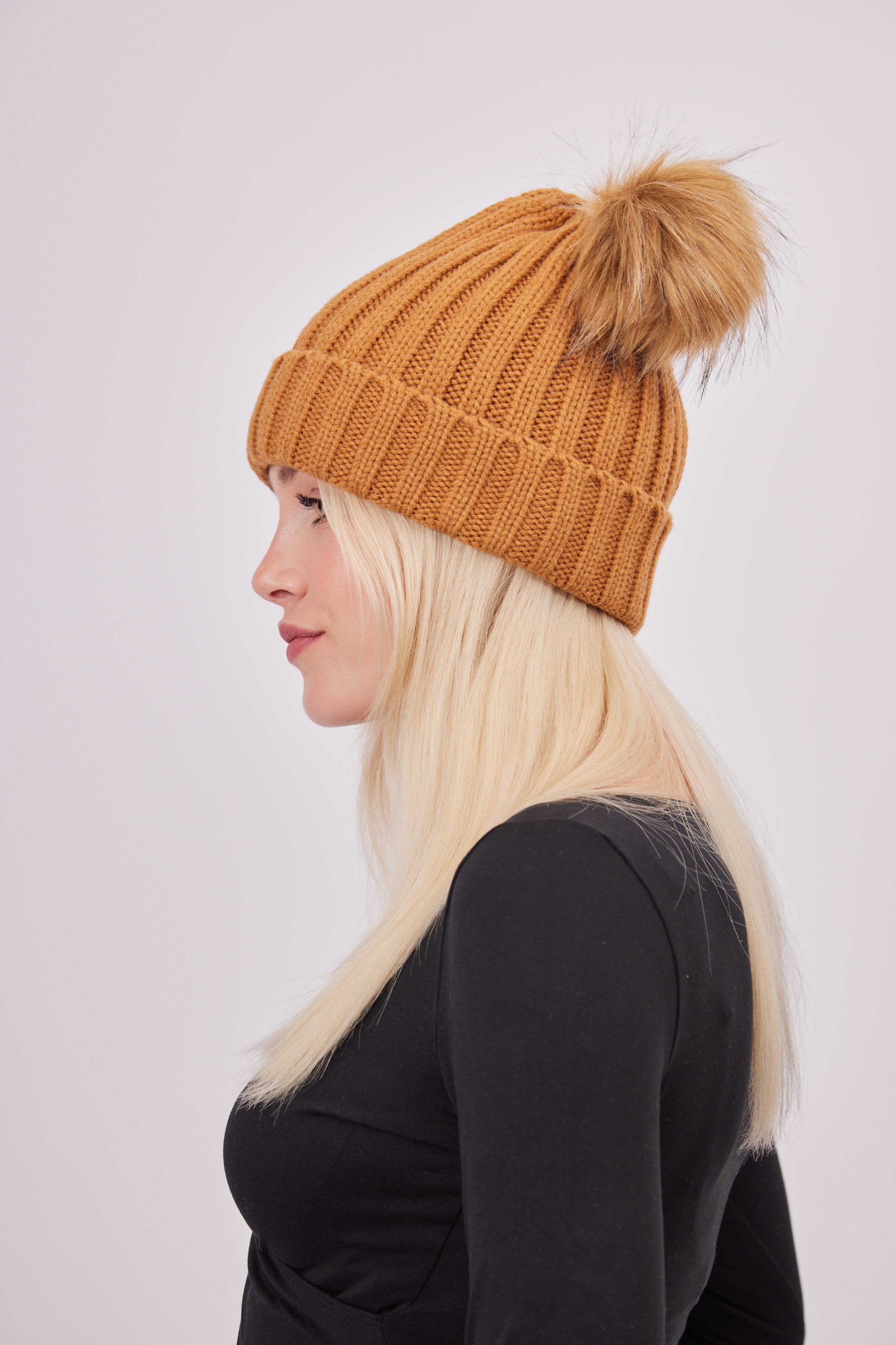 Woman's Knitted Double Fur Pom Beanie in Toffee Brown