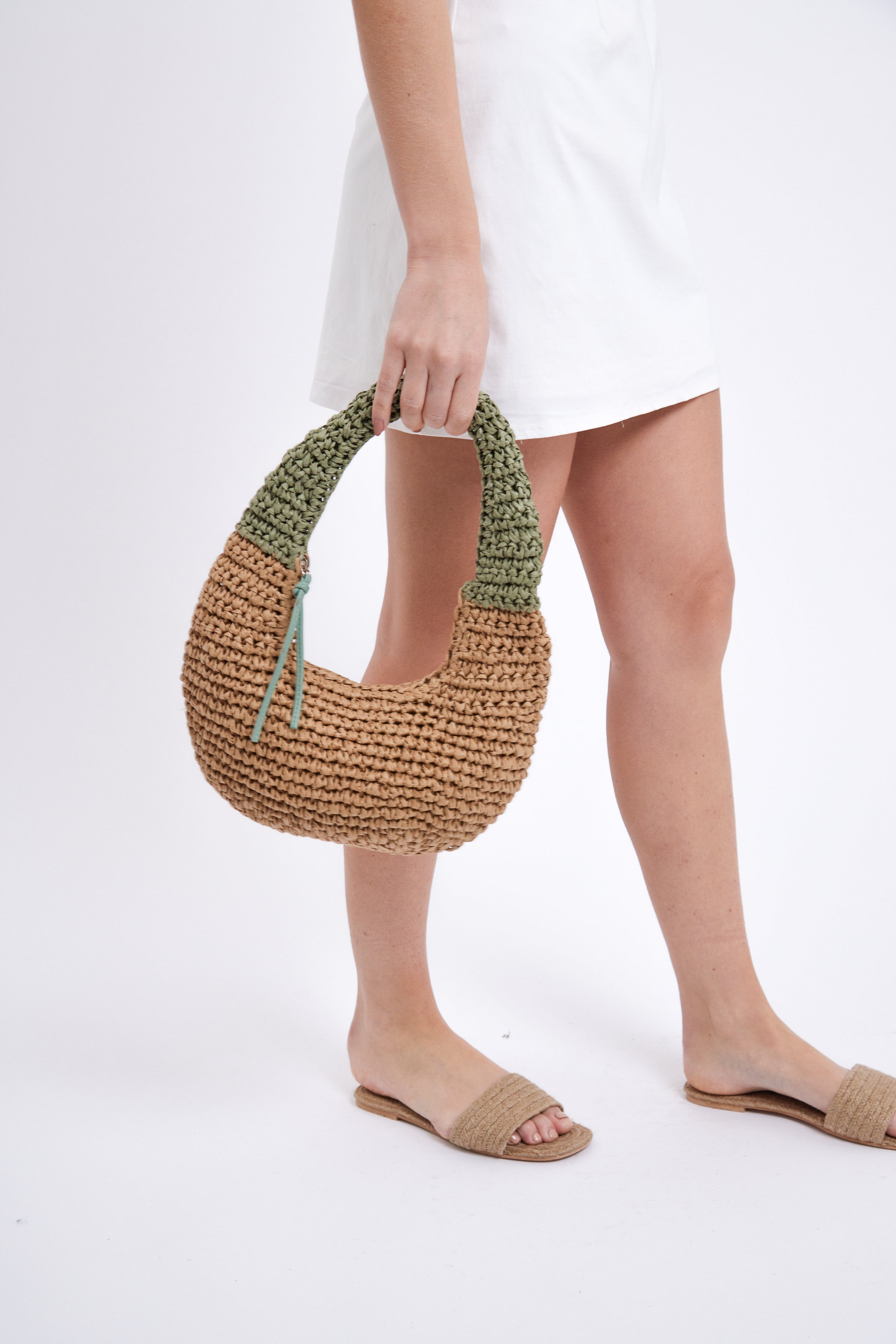 Women’s Round Straw Shoulder Bag in Natural with Green Handles 