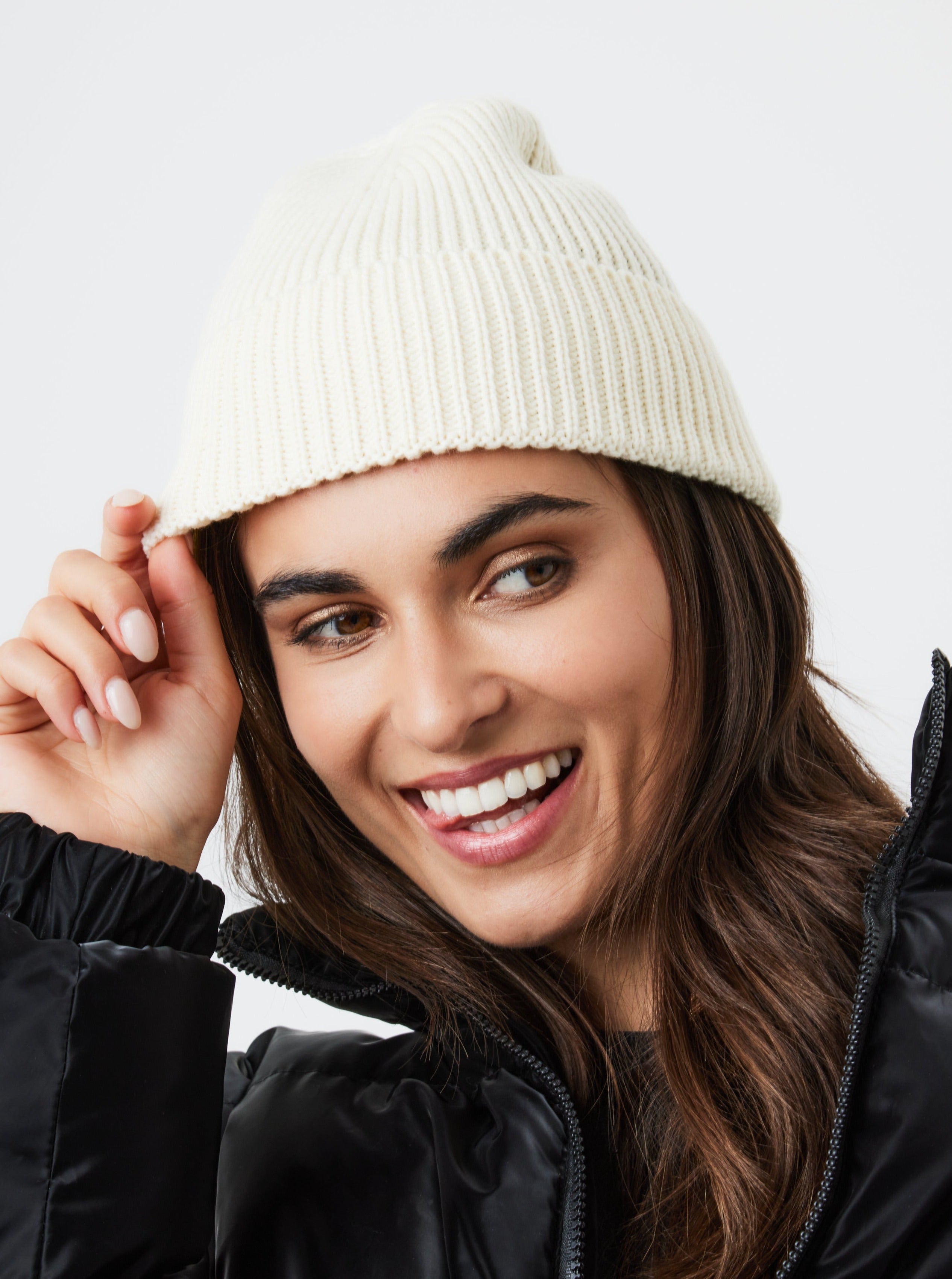 Woman's Ribbed Knitted Beanie in Cream