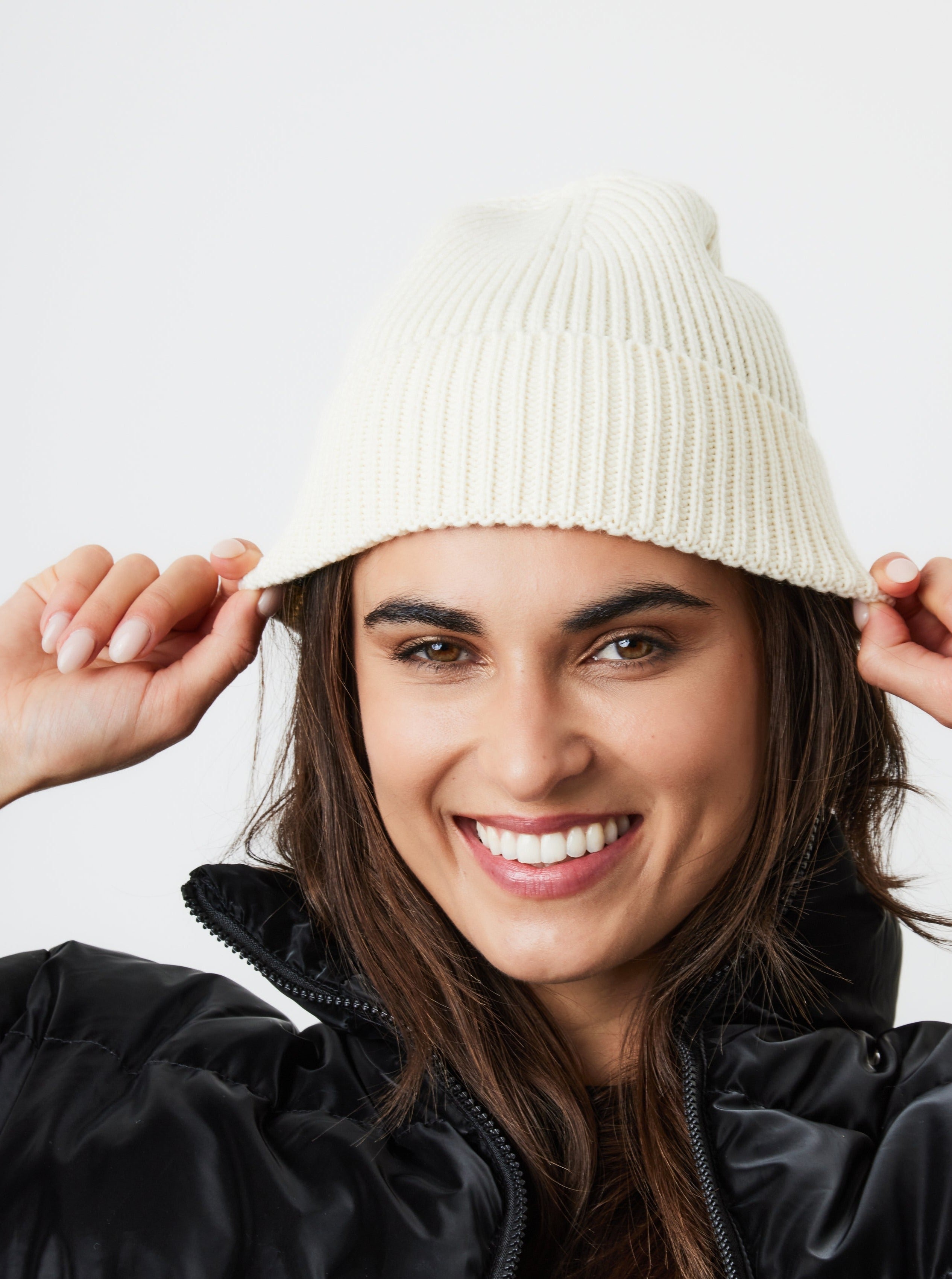 Woman's Ribbed Knitted Beanie in Cream