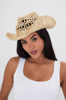 Girl Wearing a women's Seagrass Straw Open Weave Cowboy Hat in Natural Straw