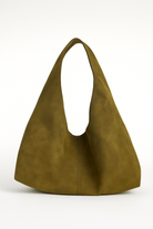 Suede Green slouchy handbag on a white background