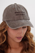 Women’s Wellness Studios Baseball Cap in Washed Brown 