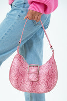 My Accessories London snake curved bag in pink | Shoulder bag in pink | Women's curved bag
